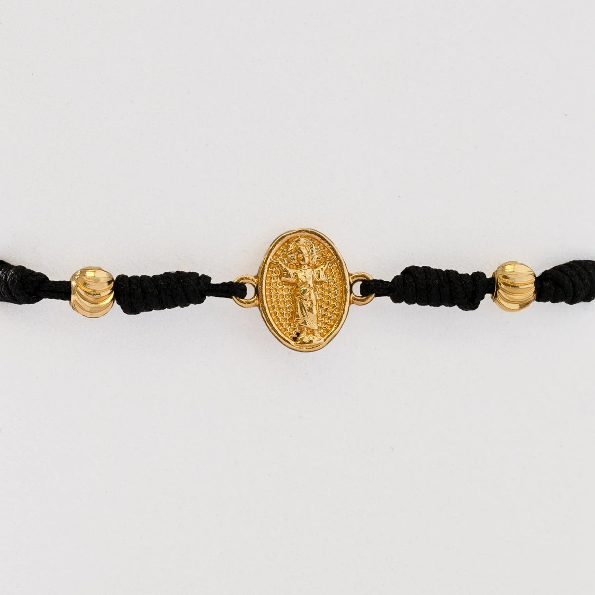 Guillo Divino Niño Negro, tejido a mano con balines de oro laminado 18k