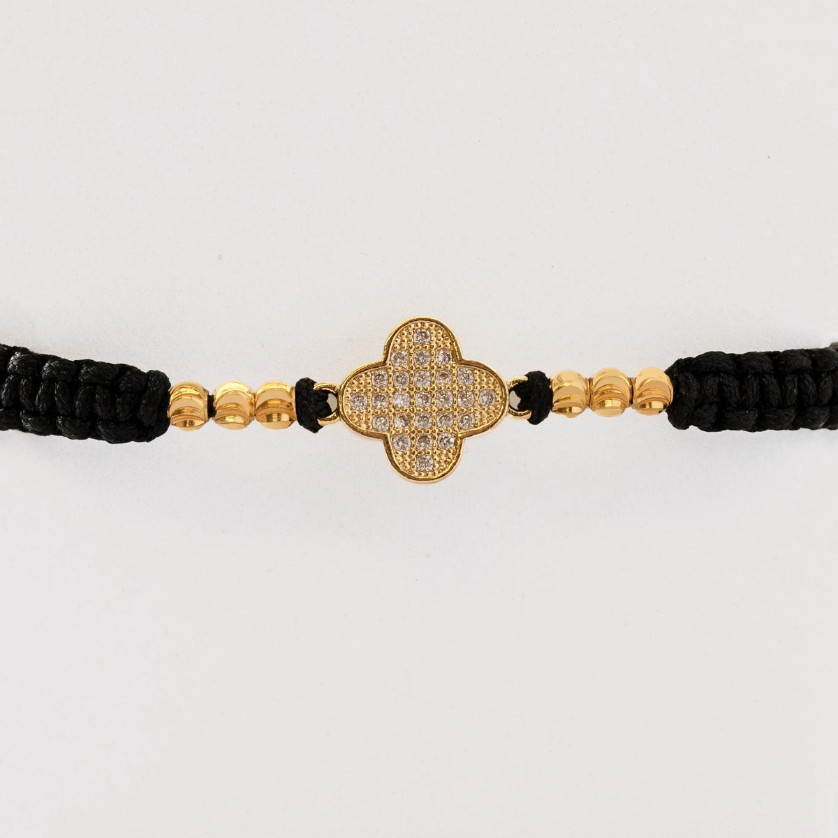 Guillo Lucky Negro, tejido a mano con balines de oro laminado 18k