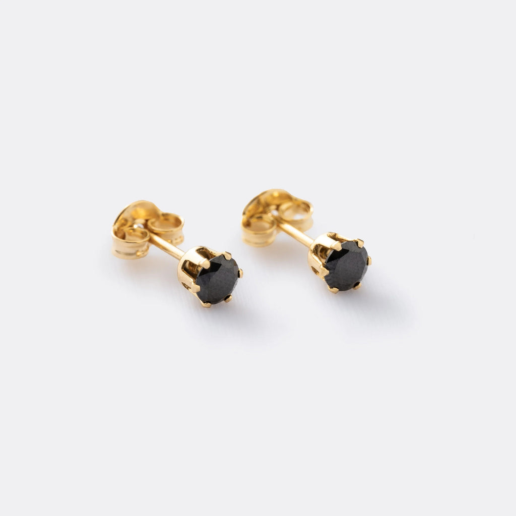 Aretes Topo Circonia Redonda Negra de oro laminado 18k