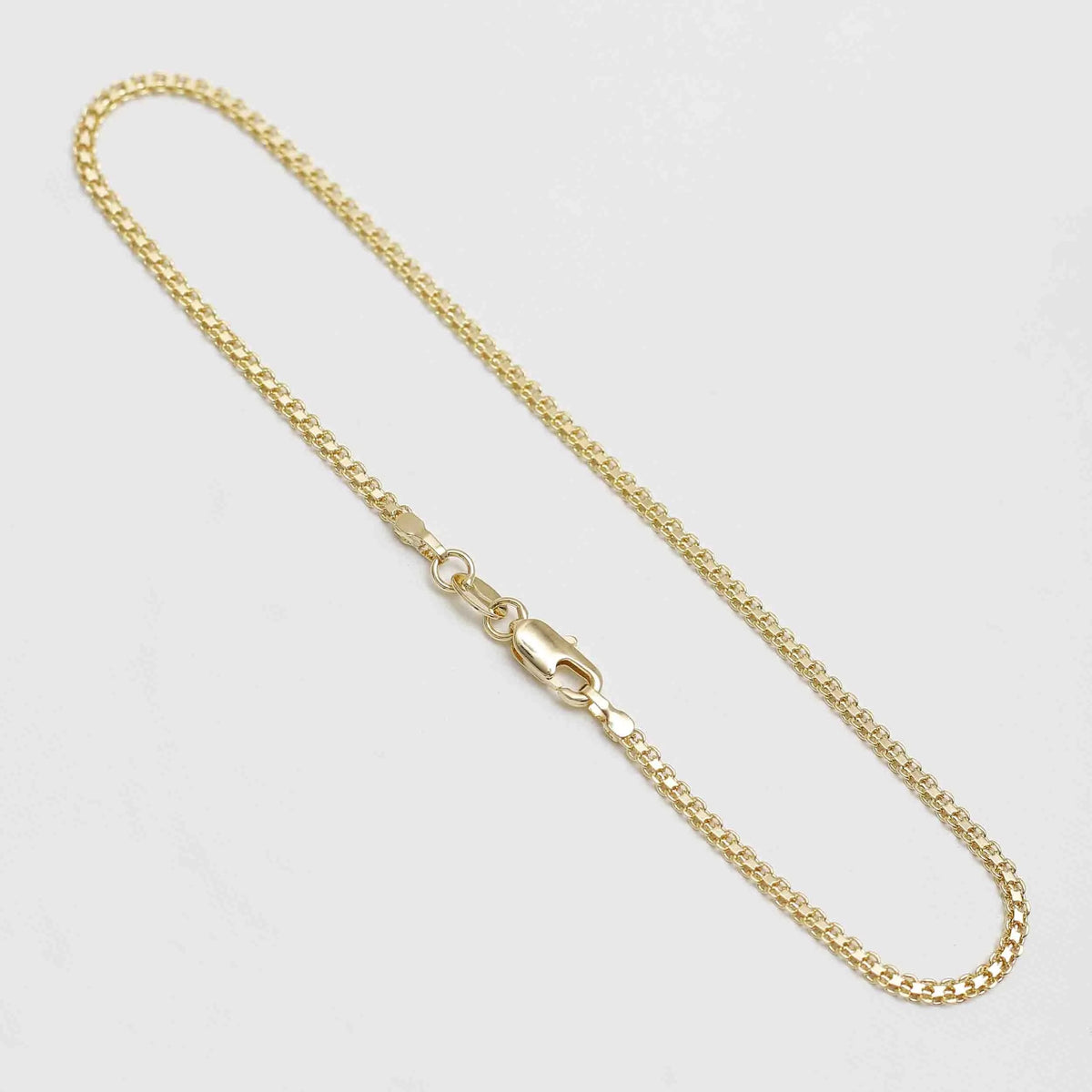 Guillo de pie Tejido Chino 2 mm 25 cm de oro laminado 18k