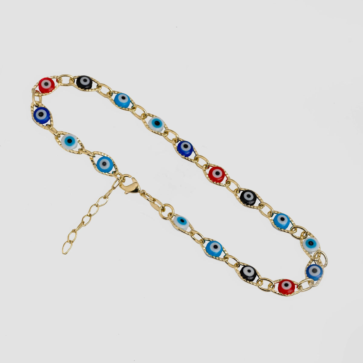 Guillo de pie Ojo Turco Multicolor 23 cm + 2 cm de extensor de oro laminado 18k